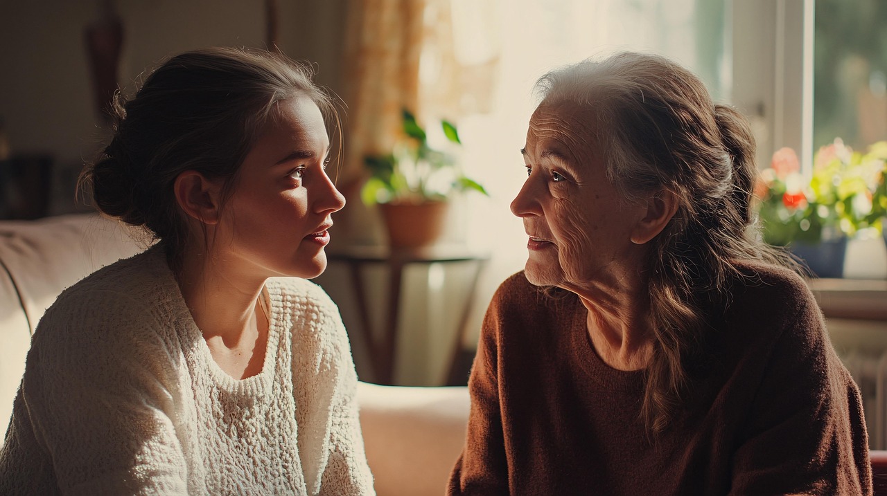 Carer supporting an older resident at home